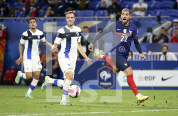 2021-09-07 - Theo Hernandez of France, Leo Vaisanen of Finland (left) during the FIFA World Cup Qatar 2022, Qualifiers, Group D football match between France and Finland on September 7, 2021 at Groupama stadium in Decines-Charpieu near Lyon, France - FIFA WORLD CUP QATAR 2022, QUALIFIERS, GROUP D - FRANCE AND FINLAND - FIFA WORLD CUP - SOCCER