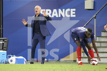 2021-09-07 - Coach of France Didier Deschamps, Paul Pogba of France during the FIFA World Cup Qatar 2022, Qualifiers, Group D football match between France and Finland on September 7, 2021 at Groupama stadium in Decines-Charpieu near Lyon, France - FIFA WORLD CUP QATAR 2022, QUALIFIERS, GROUP D - FRANCE AND FINLAND - FIFA WORLD CUP - SOCCER