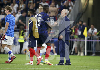 2021-09-07 - Coach of France Didier Deschamps salutes Nordi Mukiele of France following the FIFA World Cup Qatar 2022, Qualifiers, Group D football match between France and Finland on September 7, 2021 at Groupama stadium in Decines-Charpieu near Lyon, France - FIFA WORLD CUP QATAR 2022, QUALIFIERS, GROUP D - FRANCE AND FINLAND - FIFA WORLD CUP - SOCCER