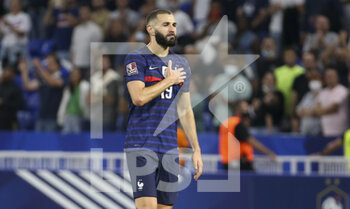 2021-09-07 - Karim Benzema of France who is from Lyon salutes the supporters following the FIFA World Cup Qatar 2022, Qualifiers, Group D football match between France and Finland on September 7, 2021 at Groupama stadium in Decines-Charpieu near Lyon, France - FIFA WORLD CUP QATAR 2022, QUALIFIERS, GROUP D - FRANCE AND FINLAND - FIFA WORLD CUP - SOCCER