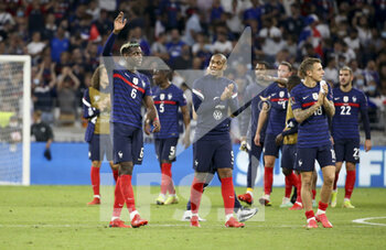 2021-09-07 - Paul Pogba, Anthony Martial, Lucas Digne of France salute the supporters following the FIFA World Cup Qatar 2022, Qualifiers, Group D football match between France and Finland on September 7, 2021 at Groupama stadium in Decines-Charpieu near Lyon, France - FIFA WORLD CUP QATAR 2022, QUALIFIERS, GROUP D - FRANCE AND FINLAND - FIFA WORLD CUP - SOCCER