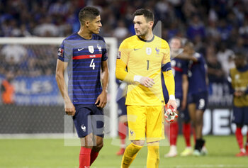 2021-09-07 - Raphael Varane, goalkeeper of France Hugo Lloris during the FIFA World Cup Qatar 2022, Qualifiers, Group D football match between France and Finland on September 7, 2021 at Groupama stadium in Decines-Charpieu near Lyon, France - FIFA WORLD CUP QATAR 2022, QUALIFIERS, GROUP D - FRANCE AND FINLAND - FIFA WORLD CUP - SOCCER
