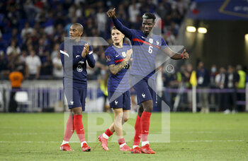 2021-09-07 - Paul Pogba, left Anthony Martial, Lucas Digne of France salute the supporters following the FIFA World Cup Qatar 2022, Qualifiers, Group D football match between France and Finland on September 7, 2021 at Groupama stadium in Decines-Charpieu near Lyon, France - FIFA WORLD CUP QATAR 2022, QUALIFIERS, GROUP D - FRANCE AND FINLAND - FIFA WORLD CUP - SOCCER