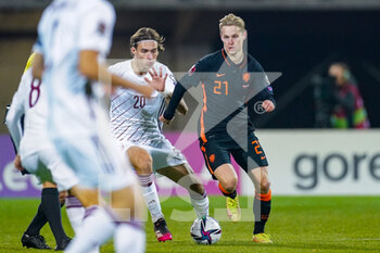 2021-10-08 - Roberts Uldrikis of Latvia, Frenkie de Jong of the Netherlands during the FIFA World Cup 2022, Qualifiers football match between Latvia and Netherlands on October 8, 2021 at Daugava Stadium in Riga, Latvia - FIFA WORLD CUP 2022, QUALIFIERS - LATVIA AND NETHERLANDS - FIFA WORLD CUP - SOCCER
