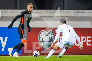2021-10-08 - Noa Lang of the Netherlands, Daniels Ontuzans of Latvia during the FIFA World Cup 2022, Qualifiers football match between Latvia and Netherlands on October 8, 2021 at Daugava Stadium in Riga, Latvia - FIFA WORLD CUP 2022, QUALIFIERS - LATVIA AND NETHERLANDS - FIFA WORLD CUP - SOCCER