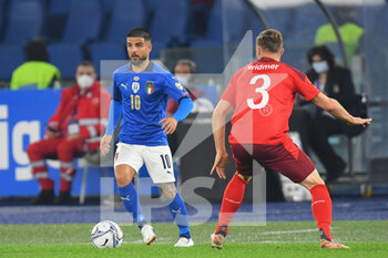 2021-11-12 - ROME, ITALY - November 12 : Lorenzo Insigne  ( L) of  Italy competes for the ball  Silvan Widme (R) of Svizzera  during the  World Cup Qualifiers Group C soccer match between  Italy and Svizzera Stadio Olimpico on November 12,2021 in Rome Italy - FIFA WORLD CUP QATAR 2022 QUALIFIERS - ITALY VS SWITZERLAND - FIFA WORLD CUP - SOCCER