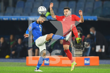 2021-11-12 - ROME, ITALY - November 12 : Lorenzo Insigne   ( L) of  Italy competes for the ball  Steffen Renato  (R) of Svizzera  during the  World Cup Qualifiers Group C soccer match between  Italy and Svizzera Stadio Olimpico on November 12,2021 in Rome Italy - FIFA WORLD CUP QATAR 2022 QUALIFIERS - ITALY VS SWITZERLAND - FIFA WORLD CUP - SOCCER