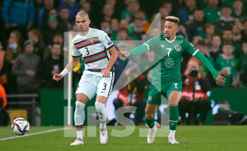 2021-11-11 - Pepe of Portugal and Calum Robinson of Ireland during the FIFA World Cup 2022, Qualifiers Group A football match between Republic of Ireland and Portugal on November 11, 2021 at Aviva Stadium in Dublin, Republic of Ireland - REPUBLIC OF IRELAND VS PORTUGAL - FIFA WORLD CUP - SOCCER