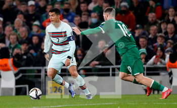 2021-11-11 - Cristiano Ronaldo of Portugal and Matt Doherty of Ireland during the FIFA World Cup 2022, Qualifiers Group A football match between Republic of Ireland and Portugal on November 11, 2021 at Aviva Stadium in Dublin, Republic of Ireland - REPUBLIC OF IRELAND VS PORTUGAL - FIFA WORLD CUP - SOCCER