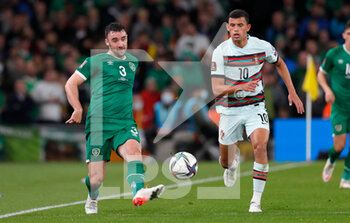 2021-11-11 - Enda Stevens of Ireland and Matheus Nunes of Portugal during the FIFA World Cup 2022, Qualifiers Group A football match between Republic of Ireland and Portugal on November 11, 2021 at Aviva Stadium in Dublin, Republic of Ireland - REPUBLIC OF IRELAND VS PORTUGAL - FIFA WORLD CUP - SOCCER