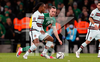 2021-11-11 - Renato Sanches Portugal and Will Keane of Ireland during the FIFA World Cup 2022, Qualifiers Group A football match between Republic of Ireland and Portugal on November 11, 2021 at Aviva Stadium in Dublin, Republic of Ireland - REPUBLIC OF IRELAND VS PORTUGAL - FIFA WORLD CUP - SOCCER
