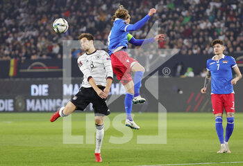 2021-11-11 - Leon Goretzka of Germany and Aron Sele of Liechtenstein during the FIFA World Cup 2022, Qualifiers Group J football match between Germany and Liechtenstein on November 11, 2021 at Volkswagen Arena in Wolfsburg, Germany - FIFA WORLD CUP 2022, QUALIFIERS GROUP J - GERMANY VS LIECHTENSTEIN - FIFA WORLD CUP - SOCCER
