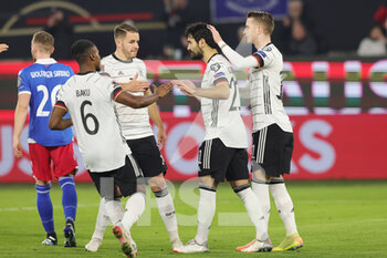 2021-11-11 - Ilkay Gundogan of Germany celebrates with Ridle Baku, Christian Gunter, Marco Reus during the FIFA World Cup 2022, Qualifiers Group J football match between Germany and Liechtenstein on November 11, 2021 at Volkswagen Arena in Wolfsburg, Germany - FIFA WORLD CUP 2022, QUALIFIERS GROUP J - GERMANY VS LIECHTENSTEIN - FIFA WORLD CUP - SOCCER