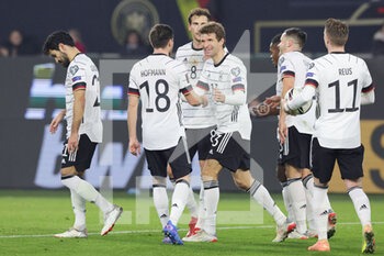 2021-11-11 - Thomas Muller, Jonas Hofmann, Leon Goretzka of Germany celebrate during the FIFA World Cup 2022, Qualifiers Group J football match between Germany and Liechtenstein on November 11, 2021 at Volkswagen Arena in Wolfsburg, Germany - FIFA WORLD CUP 2022, QUALIFIERS GROUP J - GERMANY VS LIECHTENSTEIN - FIFA WORLD CUP - SOCCER