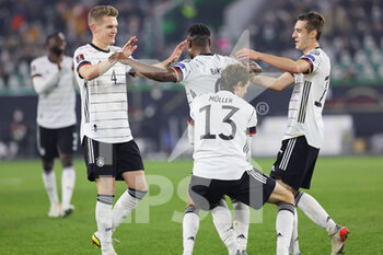 2021-11-11 - Ridle Baku of Germany celebrates his goal with Matthias Ginter, Thomas Muller, Florian Neuhaus during the FIFA World Cup 2022, Qualifiers Group J football match between Germany and Liechtenstein on November 11, 2021 at Volkswagen Arena in Wolfsburg, Germany - FIFA WORLD CUP 2022, QUALIFIERS GROUP J - GERMANY VS LIECHTENSTEIN - FIFA WORLD CUP - SOCCER