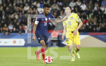 2021-11-13 - Kingsley Coman of France, Yerkin Tapalov of Kazakhstan during the FIFA World Cup 2022, Qualifiers Group D football match between France and Kazakhstan on November 13, 2021 at Parc des Princes, Paris, France - FIFA WORLD CUP 2022, QUALIFIERS GROUP D - FRANCE VS KAZAKHSTAN - FIFA WORLD CUP - SOCCER