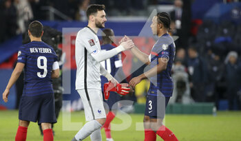 2021-11-13 - Goalkeeper of France Hugo Lloris, Jules Kounde celebrate the victory and the qualification for the World Cup in Qatar following the FIFA World Cup 2022, Qualifiers Group D football match between France and Kazakhstan on November 13, 2021 at Parc des Princes, Paris, France - FIFA WORLD CUP 2022, QUALIFIERS GROUP D - FRANCE VS KAZAKHSTAN - FIFA WORLD CUP - SOCCER
