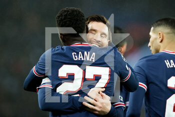 2021-12-07 - Lionel Messi of Paris Saint-Germain celebrates scoring his side's third goal with Idrissa Gana Gueye during the UEFA Champions League, Group A football match between Paris Saint-Germain and Club Brugge on December 7, 2021 at Parc des Princes stadium in Paris, France - PARIS SAINT-GERMAIN VS CLUB BRUGGE - UEFA CHAMPIONS LEAGUE - SOCCER