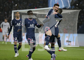 2021-12-07 - Lionel Messi of PSG celebrates his first goal with Kylian Mbappe, left Idrissa Gueye Gana, Achraf Hakimi during the UEFA Champions League, Group A football match between Paris Saint-Germain (PSG) and Club Brugge on December 7, 2021 at Parc des Princes stadium in Paris, France - PARIS SAINT-GERMAIN VS CLUB BRUGGE - UEFA CHAMPIONS LEAGUE - SOCCER