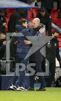 2021-12-07 - Coach of PSG Mauricio Pochettino salutes coach of Club Brugge Philippe Clement following the UEFA Champions League, Group A football match between Paris Saint-Germain (PSG) and Club Brugge on December 7, 2021 at Parc des Princes stadium in Paris, France - PARIS SAINT-GERMAIN VS CLUB BRUGGE - UEFA CHAMPIONS LEAGUE - SOCCER