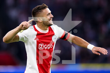 2021-08-14 - Dusan Tadic of Ajax celebrates after scoring his sides fourth goal during the Netherlands championship Eredivisie football match between Ajax and NEC on August 14, 2021 at the Johan Cruijff ArenA in Amsterdam, Netherlands - Photo Herman Dingler / Orange Pictures / DPPI - AJAX VS NEC - NETHERLANDS EREDIVISIE - SOCCER