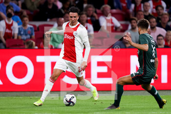 2021-08-14 - Steven Berghuis of Ajax and Souffian el Karouani of NEC during the Netherlands championship Eredivisie football match between Ajax and NEC on August 14, 2021 at the Johan Cruijff ArenA in Amsterdam, Netherlands - Photo Herman Dingler / Orange Pictures / DPPI - AJAX VS NEC - NETHERLANDS EREDIVISIE - SOCCER