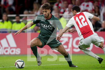 2021-08-14 - Souffian el Karouani of NEC and Noussair Mazraoui of Ajax during the Netherlands championship Eredivisie football match between Ajax and NEC on August 14, 2021 at the Johan Cruijff ArenA in Amsterdam, Netherlands - Photo Broer van den Boom / Orange Pictures / DPPI - AJAX VS NEC - NETHERLANDS EREDIVISIE - SOCCER