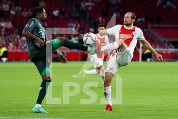 2021-08-14 - Jonathan Okita of NEC and Daley Blind of Ajax during the Netherlands championship Eredivisie football match between Ajax and NEC on August 14, 2021 at the Johan Cruijff ArenA in Amsterdam, Netherlands - Photo Herman Dingler / Orange Pictures / DPPI - AJAX VS NEC - NETHERLANDS EREDIVISIE - SOCCER
