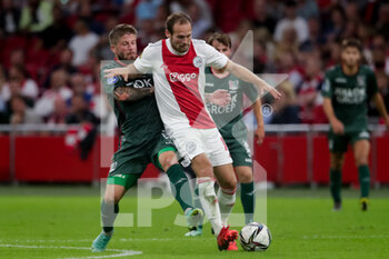 2021-08-14 - Lasse Schone of NEC and Daley Blind of Ajax during the Netherlands championship Eredivisie football match between Ajax and NEC on August 14, 2021 at the Johan Cruijff ArenA in Amsterdam, Netherlands - Photo Broer van den Boom / Orange Pictures / DPPI - AJAX VS NEC - NETHERLANDS EREDIVISIE - SOCCER