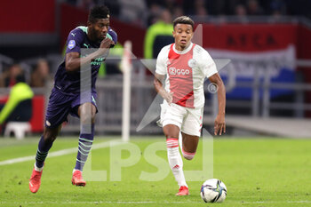 2021-10-24 - Ibrahim Sangare of PSV Eindhoven, David Neres of Ajax Amsterdam during the Netherlands championship Eredivisie football match between Ajax and PSV on October 24, 2021 at Johan Cruijff Arena in Amsterdam, Netherlands - AJAX VS PSV - NETHERLANDS EREDIVISIE - SOCCER