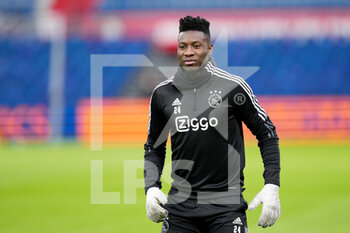 2021-12-19 - Andre Onana of Ajax Amsterdam warms up during the Netherlands championship Eredivisie football match between Feyenoord Rotterdam and AFC Ajax Amsterdam on December 19, 2021 at Stadion Feijenoord De Kuip in Rotterdam, Netherlands - FEYENOORD ROTTERDAM VS AFC AJAX AMSTERDAM - NETHERLANDS EREDIVISIE - SOCCER