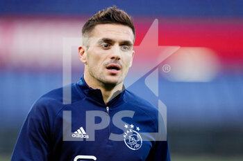 2021-12-19 - Dusan Tadic of AFC Ajax warms up during the Netherlands championship Eredivisie football match between Feyenoord Rotterdam and AFC Ajax Amsterdam on December 19, 2021 at Stadion Feijenoord De Kuip in Rotterdam, Netherlands - FEYENOORD ROTTERDAM VS AFC AJAX AMSTERDAM - NETHERLANDS EREDIVISIE - SOCCER