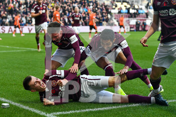2021-11-06 - Ben Woodburn of Heart of Midlothian FC celebrates after scoring the opening goal during the Scottish championship, Premiership football match between Heart of Midlothian and Dundee United on November 6, 2021 at Tynecastle Park in Edinburgh, Scotland - HEART OF MIDLOTHIAN VS DUNDEE UNITED - SCOTTISH PREMIERSHIP - SOCCER