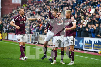 2021-11-06 - Ben Woodburn of Heart of Midlothian FC celebrates with his team mates after scoring the opening goal during the Scottish championship, Premiership football match between Heart of Midlothian and Dundee United on November 6, 2021 at Tynecastle Park in Edinburgh, Scotland - HEART OF MIDLOTHIAN VS DUNDEE UNITED - SCOTTISH PREMIERSHIP - SOCCER