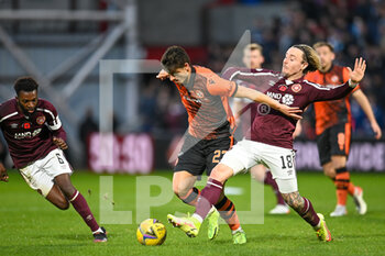 2021-11-06 - Barrie McKay of Heart of Midlothian FC tackles Ian Harkes of Dundee Utd during the Scottish championship, Premiership football match between Heart of Midlothian and Dundee United on November 6, 2021 at Tynecastle Park in Edinburgh, Scotland - HEART OF MIDLOTHIAN VS DUNDEE UNITED - SCOTTISH PREMIERSHIP - SOCCER