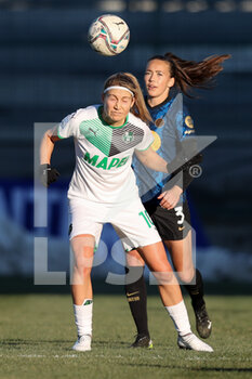 2021-12-11 - Kamila Dubcova (U.S. Sassuolo) and Elin Landstrom (FC Internazionale) battle for the ball - INTER - FC INTERNAZIONALE VS US SASSUOLO - ITALIAN SERIE A WOMEN - SOCCER