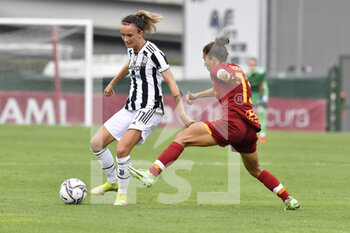 2021-10-02 - Barbara Bonansea of Juventus Women and Elisa Bartoli of AS Roma Women  in action during the Women Serie A match between AS Roma and Juventus at Tre Fontane Stadium on October 02, 2021 in Rome, Italy.  - ROMA WOMEN VS JUVENTUS FEMMINILE - ITALIAN SERIE A WOMEN - SOCCER