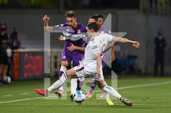 2021-08-28 - Gaetano Castrovilli (ACF Fiorentina) in action against Andrea Belotti (Torino FC) - ACF FIORENTINA VS TORINO FC - ITALIAN SERIE A - SOCCER