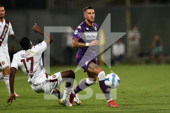 2021-08-28 - Cristiano Biraghi (ACF Fiorentina) in action against Singo  (Torino FC) - ACF FIORENTINA VS TORINO FC - ITALIAN SERIE A - SOCCER