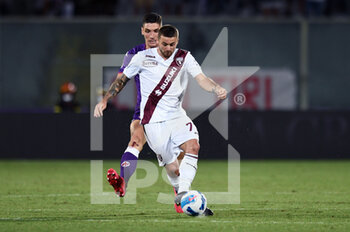 2021-08-28 - Karol Linetti (Torino FC) in action against Nikola Milenkovic (ACF Fiorentina) - ACF FIORENTINA VS TORINO FC - ITALIAN SERIE A - SOCCER