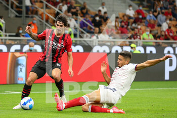 2021-08-29 - Sandro Tonali (AC Milan) in action against Alessandro Deiola (Cagliari Calcio) - AC MILAN VS CAGLIARI CALCIO - ITALIAN SERIE A - SOCCER