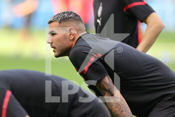 2021-09-12 - Theo Hernandez of AC Milan warms up during the Serie A 2021/22 football match between AC Milan and SS Lazio at Giuseppe Meazza Stadium, Milan, Italy on September 12, 2021 - AC MILAN VS SS LAZIO - ITALIAN SERIE A - SOCCER