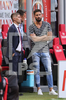 2021-09-12 - Olivier Giroud of AC Milan talks to Paolo Maldini Technical Area Director of AC Milan and Frederic Massara Sport Director of AC Milan during the Serie A 2021/22 football match between AC Milan and SS Lazio at Giuseppe Meazza Stadium, Milan, Italy on September 12, 2021 - AC MILAN VS SS LAZIO - ITALIAN SERIE A - SOCCER