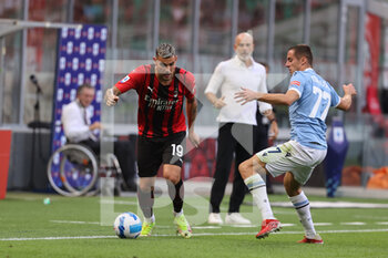 2021-09-12 - Theo Hernandez of AC Milan fights for the ball against Adam Marusic of SS Lazio during the Serie A 2021/22 football match between AC Milan and SS Lazio at Giuseppe Meazza Stadium, Milan, Italy on September 12, 2021 - AC MILAN VS SS LAZIO - ITALIAN SERIE A - SOCCER
