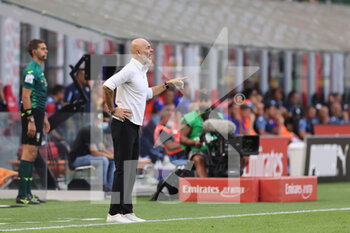 2021-09-12 - Stefano Pioli Head Coach of AC Milan reacts from the bench during the Serie A 2021/22 football match between AC Milan and SS Lazio at Giuseppe Meazza Stadium, Milan, Italy on September 12, 2021 - AC MILAN VS SS LAZIO - ITALIAN SERIE A - SOCCER