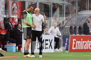 2021-09-12 - Zlatan Ibrahimovic of AC Milan and Stefano Pioli Head Coach of AC Milan during the Serie A 2021/22 football match between AC Milan and SS Lazio at Giuseppe Meazza Stadium, Milan, Italy on September 12, 2021 - AC MILAN VS SS LAZIO - ITALIAN SERIE A - SOCCER