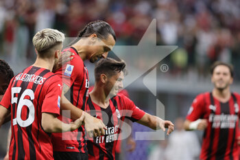 2021-09-12 - Zlatan Ibrahimovic of AC Milan celebrates with his teammates during the Serie A 2021/22 football match between AC Milan and SS Lazio at Giuseppe Meazza Stadium, Milan, Italy on September 12, 2021 - AC MILAN VS SS LAZIO - ITALIAN SERIE A - SOCCER