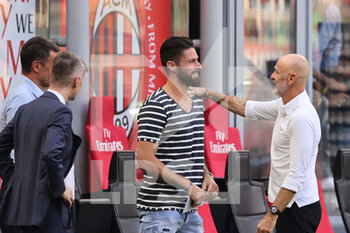 2021-09-12 - Olivier Giroud of AC Milan and Stefano Pioli Head Coach of AC Milan during the Serie A 2021/22 football match between AC Milan and SS Lazio at Giuseppe Meazza Stadium, Milan, Italy on September 12, 2021 - AC MILAN VS SS LAZIO - ITALIAN SERIE A - SOCCER