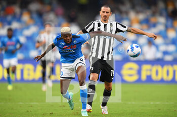 2021-09-11 - Napoli's forward Victor Osimhen compete for the ball with Juventus' defender Leonardo Bonucci  - SSC NAPOLI VS JUVENTUS FC - ITALIAN SERIE A - SOCCER