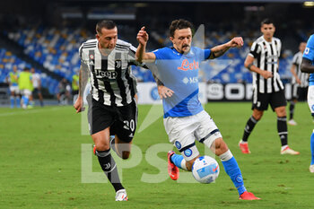 2021-09-11 - Juventus' forward Federico Bernardeschi compete for the ball with Napoli's defender Mario Rui  - SSC NAPOLI VS JUVENTUS FC - ITALIAN SERIE A - SOCCER